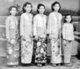 Malaysia / Singapore: Nyonya women wearing sarong kebaya dress typical of the Peranakan Straits Chinese community, c. 1950